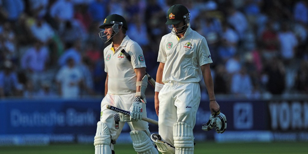 A dejected Ryan Harris (l) and James Pattinson