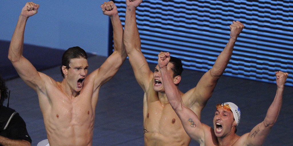 France's men's 100 m freestyle relay team celebrate