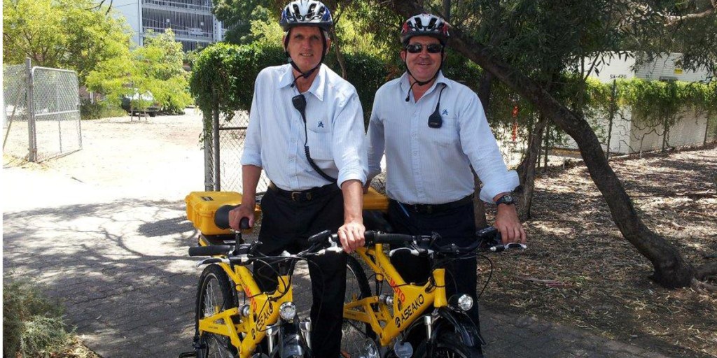Adelaide City Council parking and information officers with electric bikes they are trialling.