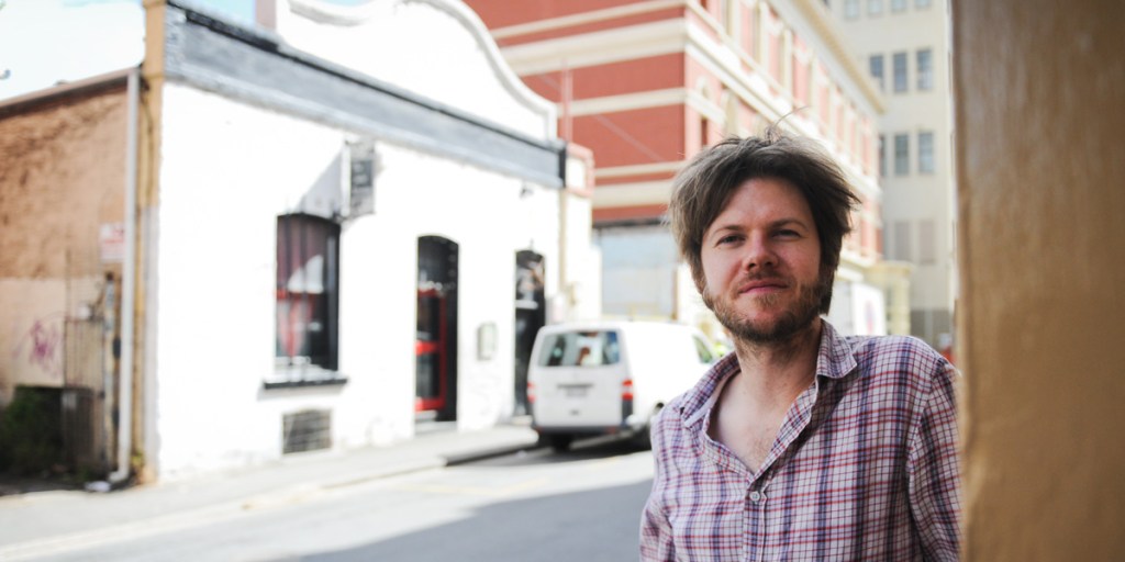 Zac Coligan outside the now-demolished old Jade Monkey venue. Photo: Nat Rogers/InDaily