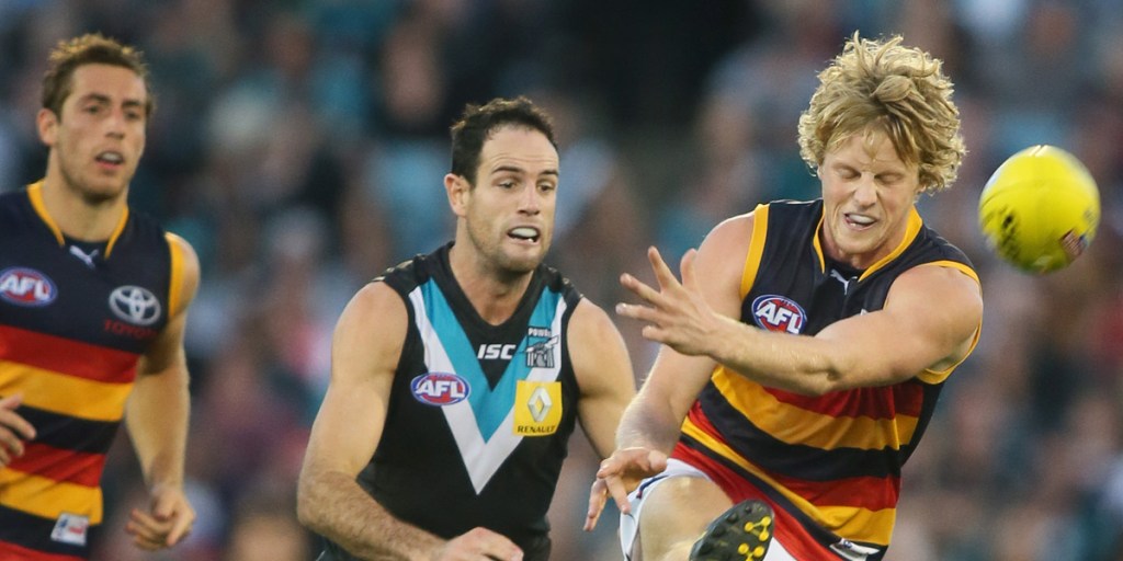 Tough midfielder Rory Sloane (right) has been ruled out of Adelaide's team to face Port Adelaide on Sunday.