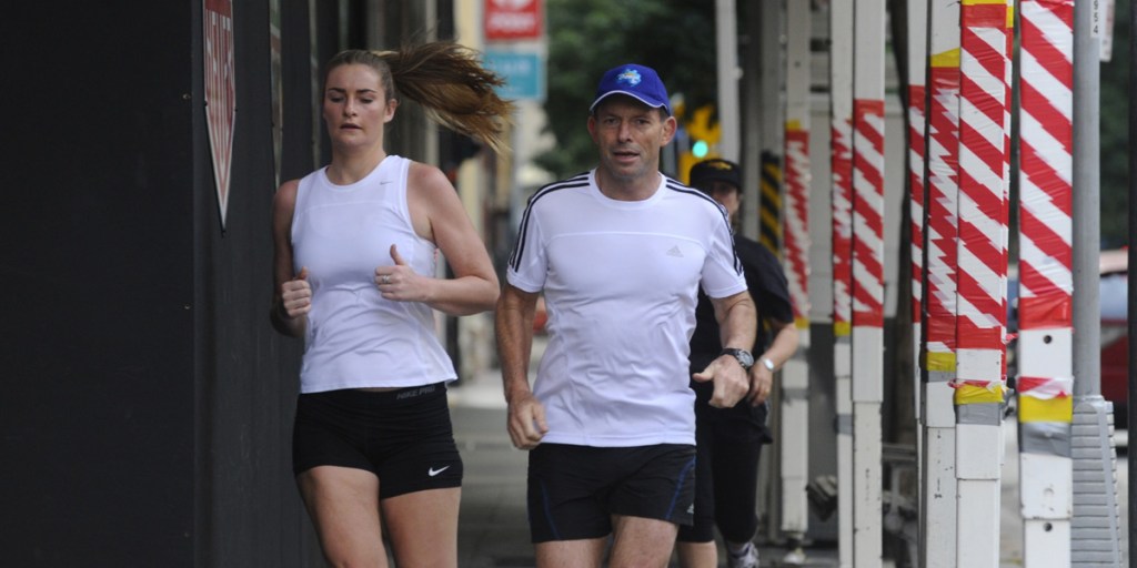 Tony Abbott on his morning run in Brisbane today, with daughter Bridget Abbott.