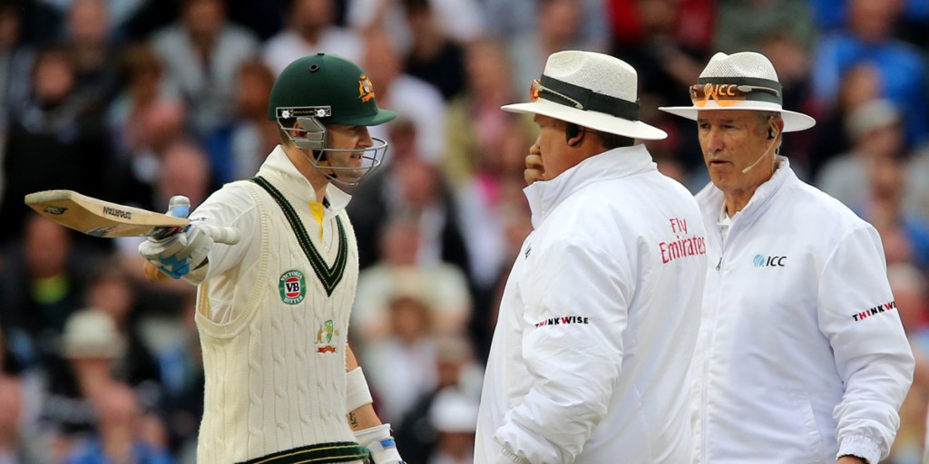 An angry Michael Clarke remonstrates with the umpires after they called off play due to bad light.