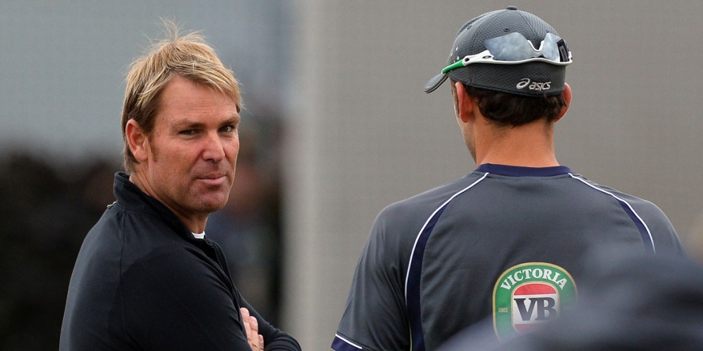 Spin great Shane Warne speaks to Nathan Lyon at Australia's practice session at Old Trafford.