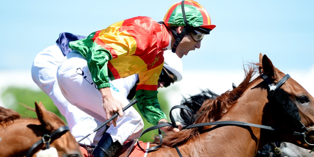Damien Oliver aboard Happy Trails