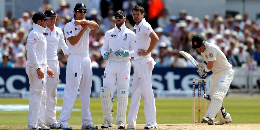 England captain Alastair Cooks signals for a review