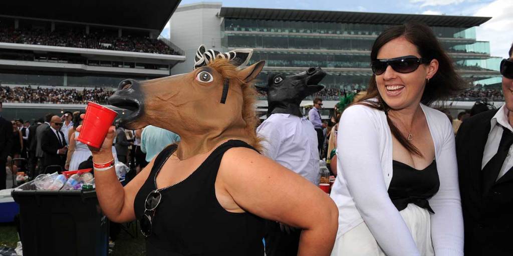 Punters enjoying themselves at Flemington during the 2012 Derby Day.