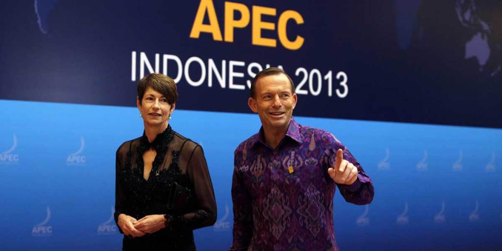 Prime Minister Tony Abbott and his wife Margaret Abbott arrive for a gala dinner at the APEC Summit in Bali yesterday.