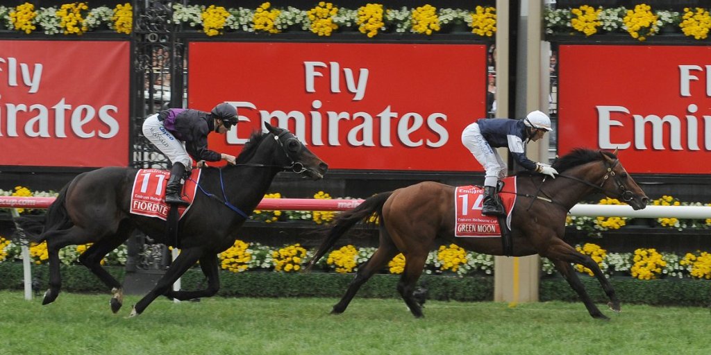 Irish stayer Green Moon ridden by jockey Brett Pebble (right) leads Fiorente over the line in last year's Melbourne Cup.