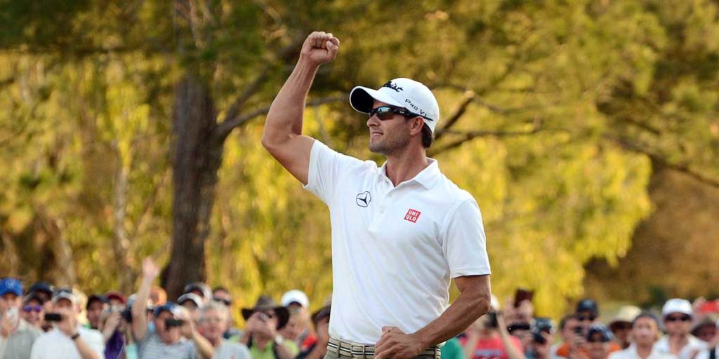 Australian golfer Adam Scott celebrates after winning the Australian PGA Championship at Royal Pines on the Gold Coast yesterday.