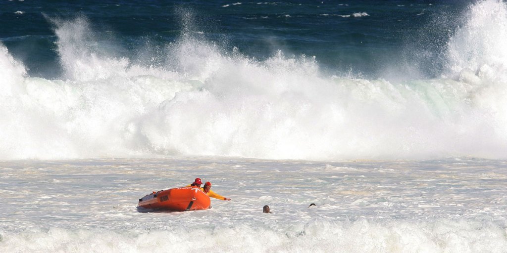 Surf Lifesavers rescue two female swimmers who were caught in a rip at Bondi Beach.