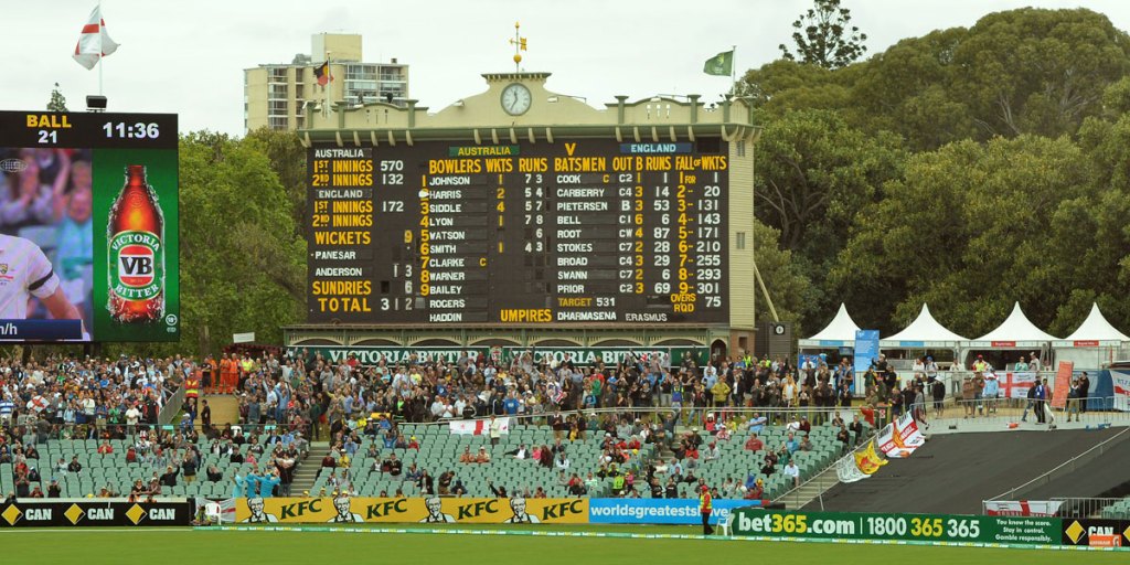 Adelaide Oval's historic scoreboard, next to the modern equivalent, on day five of the Ashes test this week.