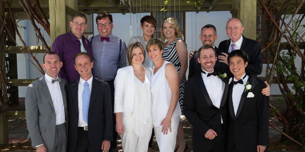 Newly married gay and lesbian couples pose for a photograph at Canberra's Old Parliament House last Saturday.