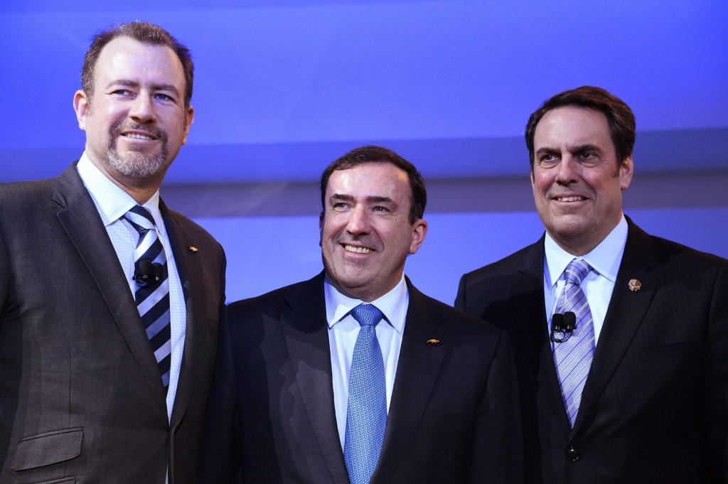 GM execs Mark Reuss (R), President General Motors North America, Alan Batey (C), Head of Sales North America, and Dan Ammann (L), 