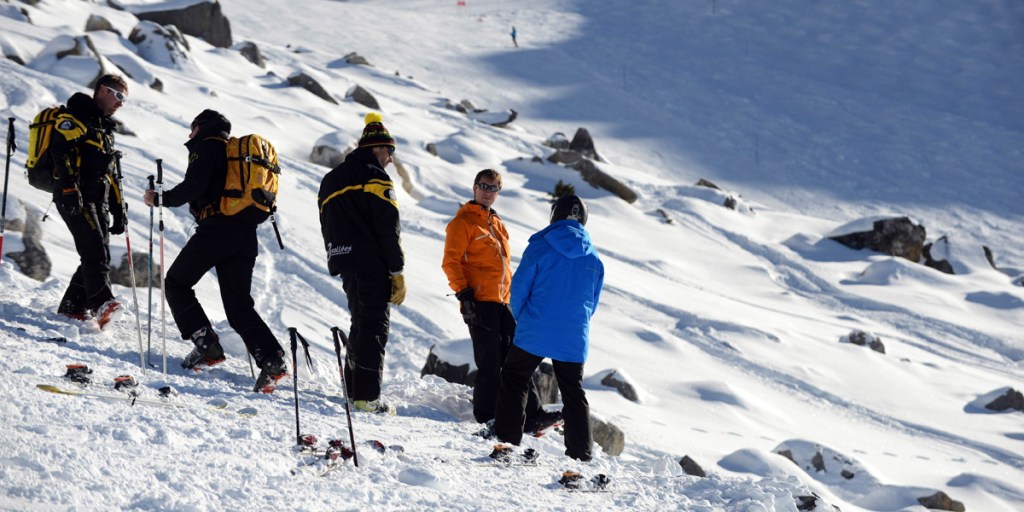 Resort officials near where Michael Schumacher had an accident at the French Alps ski resort of Meribel. Photo: AFP
