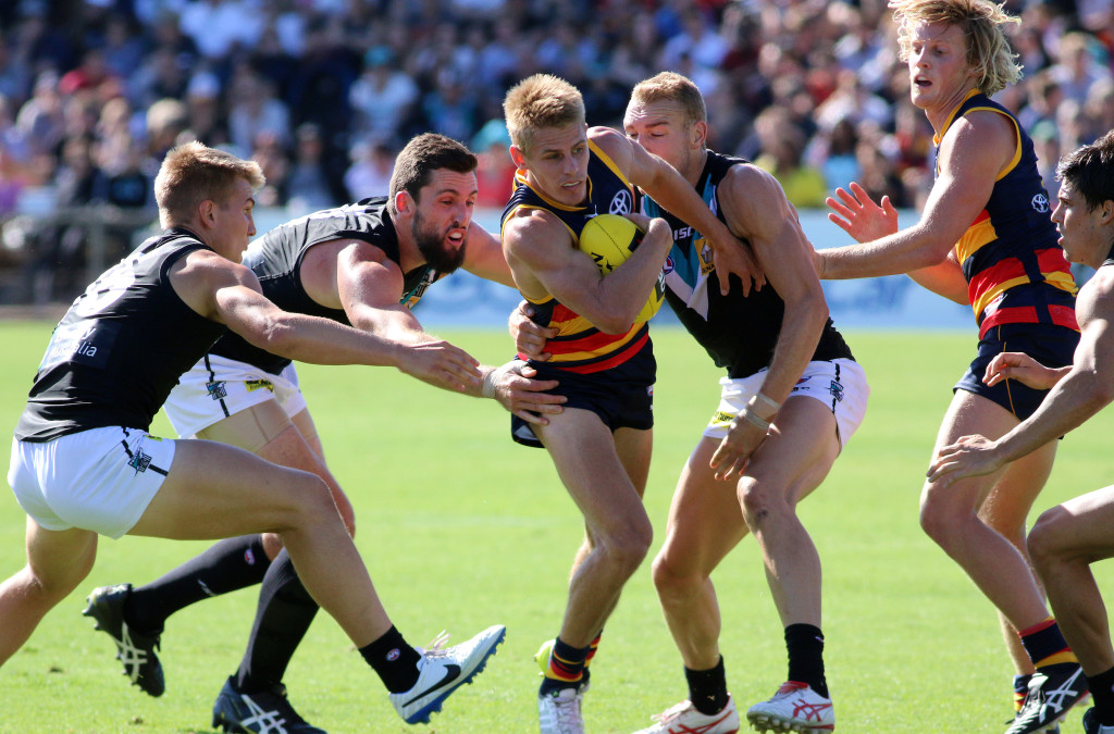 David McKay under siege from Power players. Image by Peter Argent