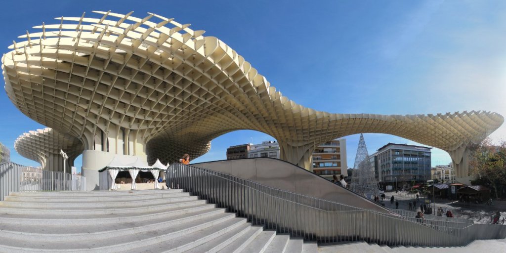 Metropol Parasol is a wooden building in the old quarter of Seville, Spain. It was designed by the German architect Jürgen Mayer-Hermann, and its construction finished in 2011. Photo: Rubendene