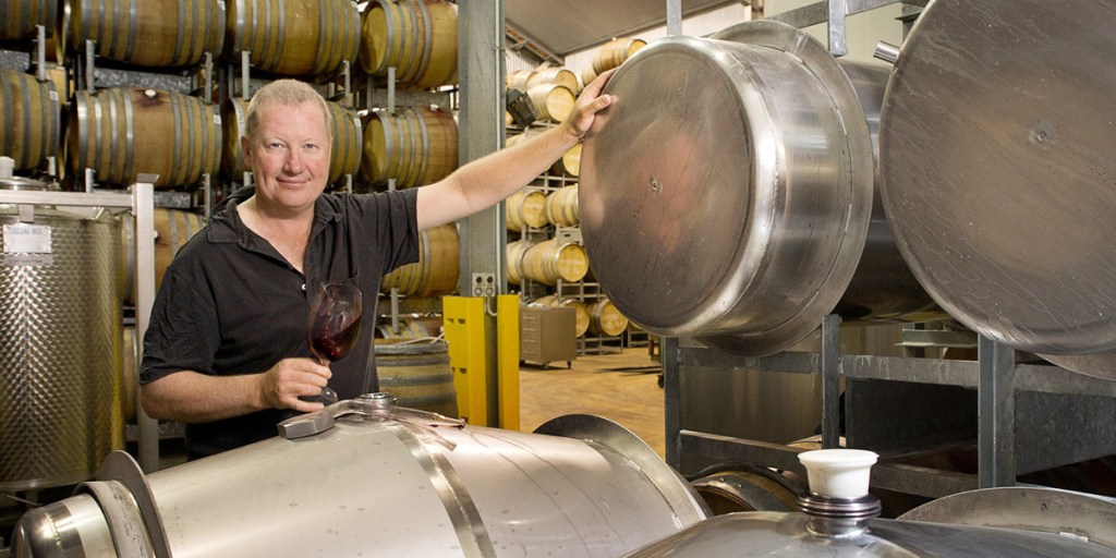 Michael Twelftree with his barrel-sized stainless-steel Grenache containers. Photo: www.donbrice.com