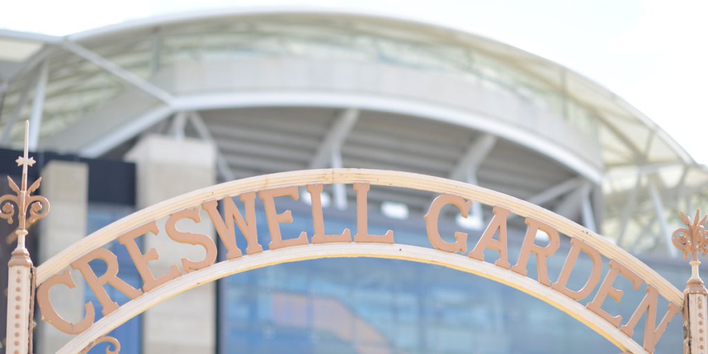 Adelaide Oval looms behind the Creswell Garden gate. Photo: Nat Rogers/InDaily