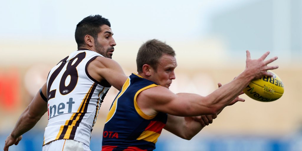 Brenton Sanderson says axing Brent Reilly (right) for tonight's game was the toughest call in his coaching career.