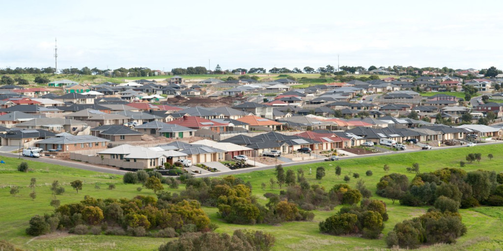 Large, suburban homes are a waste of space, argue Justin Payne & Jane Monk.