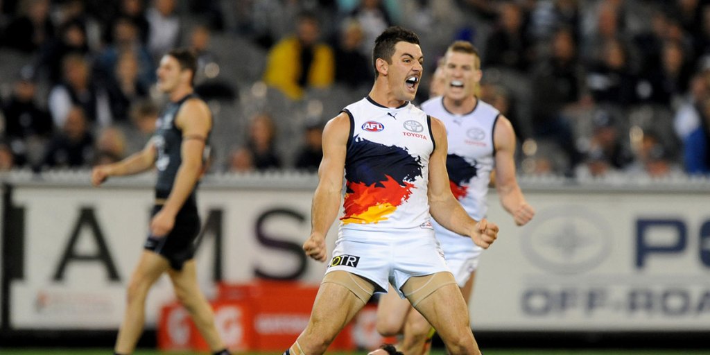 Taylor Walker celebrates a goal against Carlton yesterday. 