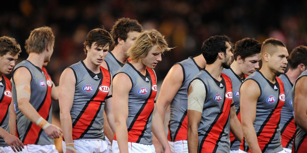 Essendon players after a loss during the ill-fated 2012 season. Player manager Peter Jess says around 15 of the 34 banned players will appeal their suspension, but did not identify who is involved.