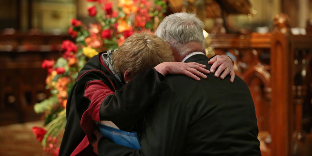 People share their grief at a service for the people killed in Malaysian Airlines flight MH17 at St Paul's Cathedral in Melbourne. Photo: AAP