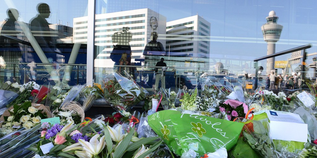 Floral tributes outside the Schiphol Airport in Amsterdam. Photo: AAP
