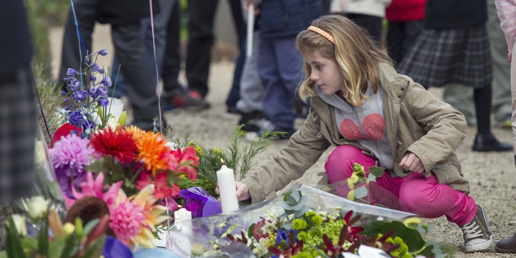 Friends and family gathered yesterday for a memorial service for five members of the van den Hende family. Photo: AAP