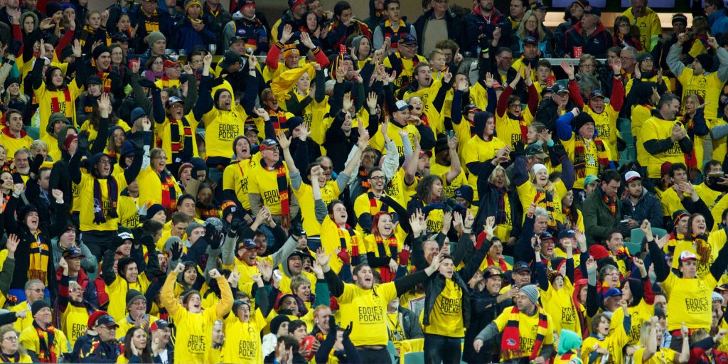 Fans wearing special "Eddie's Pocket" T-shirts looked unfortunately like Hawthorn supporters. Photo: Michael Errey