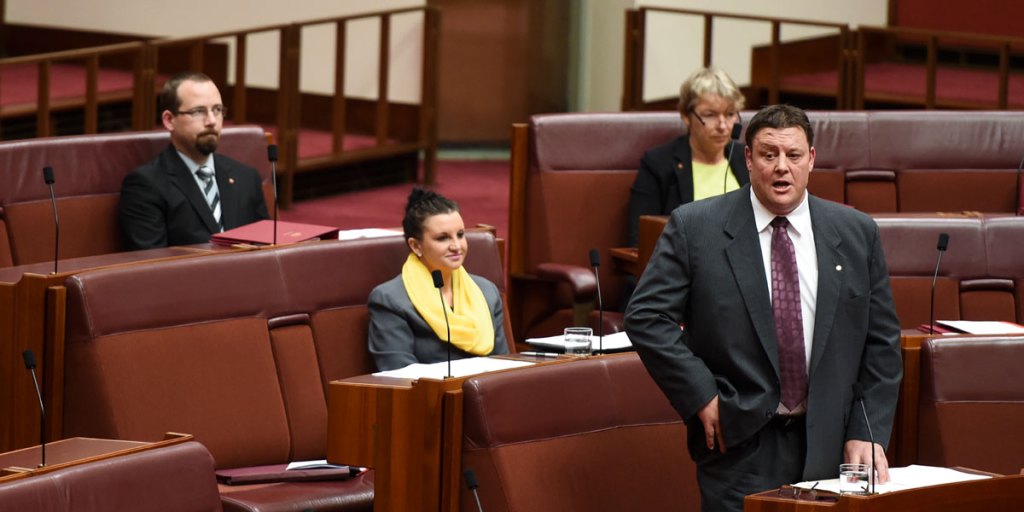 The Palmer United Party's Senate leader, Glenn Lazarus, a former rugby league champion, speaks on the carbon tax repeal bills this week. 