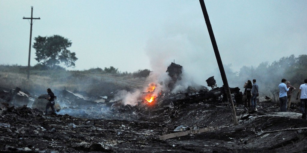 The burning remains of flight MH17.