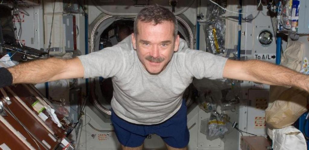 Chris Hadfield spent nearly five months on the International Space Station. Image from The Conversation.