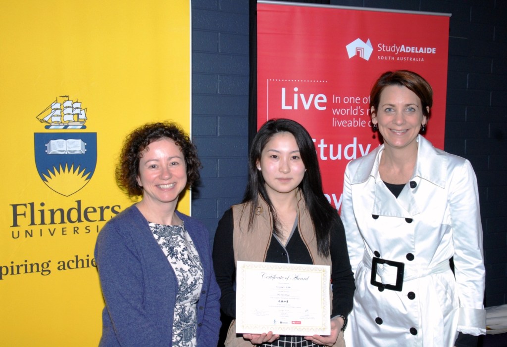 Flinders University Pro Vice-Chancellor (International), Professor Nancy Cromar, with Flinders University student, Wenjing Li, who won the FUCSSA writing competition, and Education Adelaide Chief Executive, Karyn Kent. 