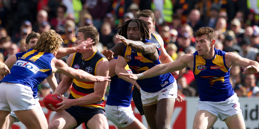 Josh Jenkins under siege from Eagles players. Image by Michael Errey