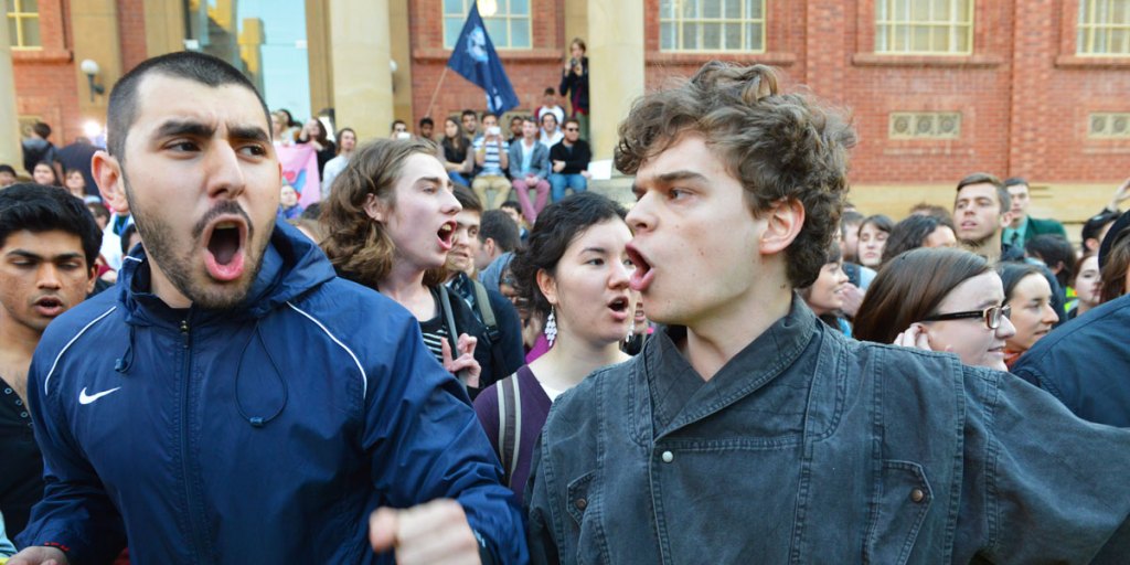 Protesters outside Tony Abbott's engagement at the University of Adelaide last night. AAP photo