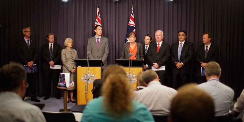Then ministers Kate Lundy (centre) and Jason Clare (to her right) flanked by sports representatives at the now infamous press conference in February 2013.