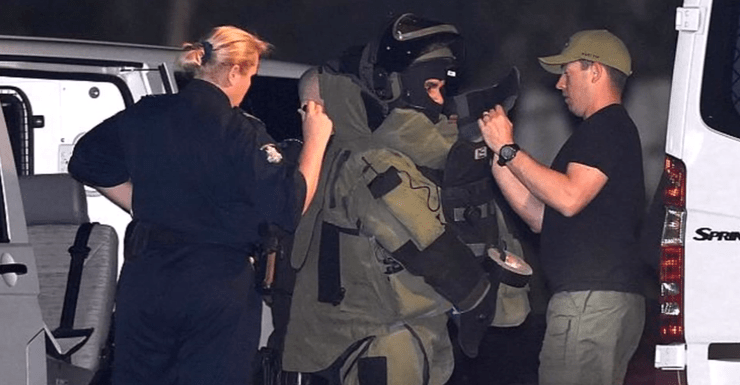 Members of the bomb squad at the scene of the shooting.