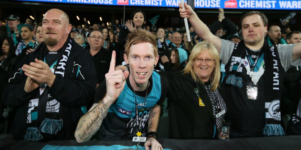 Happy Power fans at Adelaide Oval: fear of Port dominance at the Oval led to Sanderson's sacking.