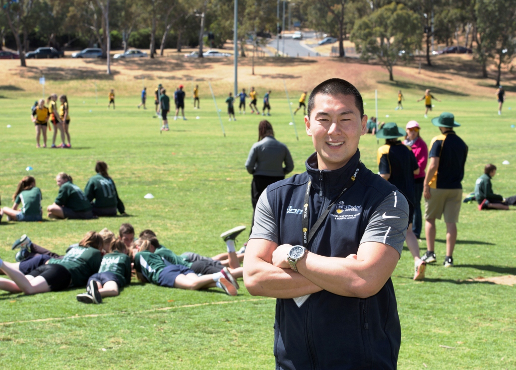Dr Sam Elliott has been assessing Flinders Physical Education students' event management skills as they host 300 local primary school children at a footy carnival on campus. 
