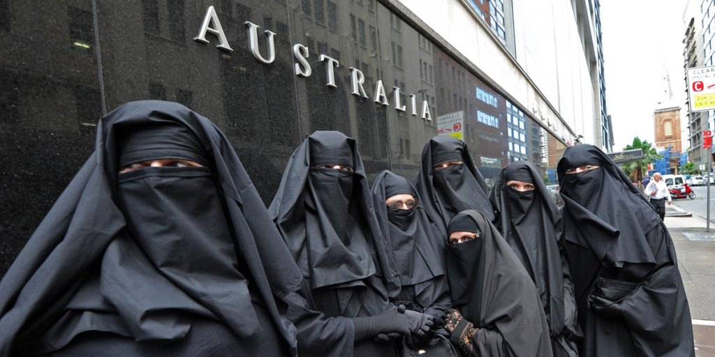 Men and women from the group Faceless call for the banning of the burqa at a rally in Sydney in 2012.