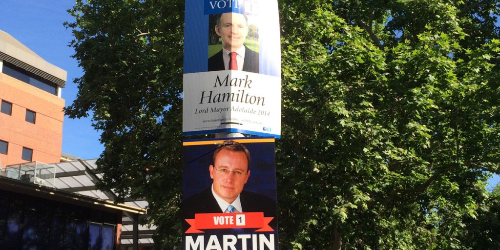 Lord Mayoral campaign posters sharing a pole on Frome Road.