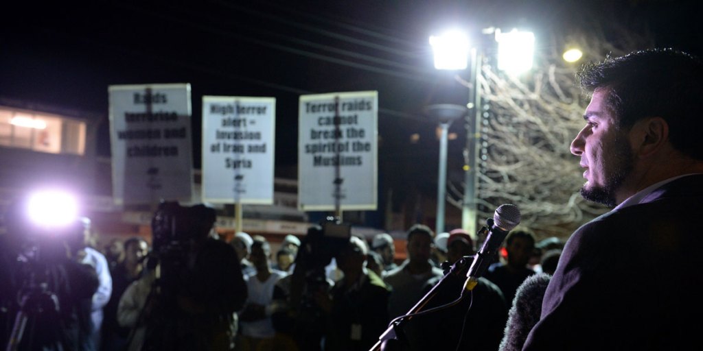 Hizb Ut-Tahrir spokesperson Wassim Doureihi leads members of the Sydney Muslim community in a rally against counter-terrorism raids.