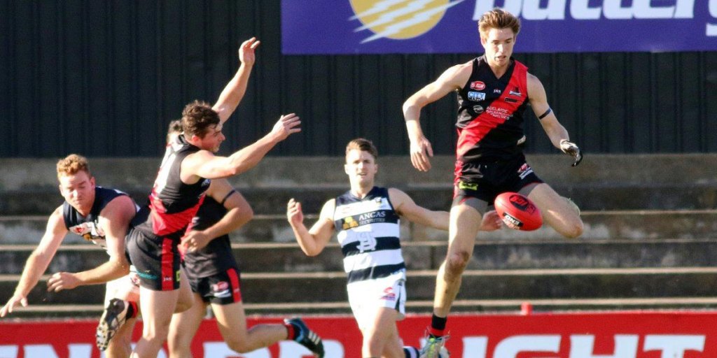 Sam Durdin (right) in action for West Adelaide. Photo: Peter Argent