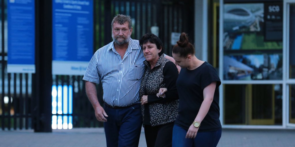 Phil Hughes' parents Greg and Virginia and sister Megan leave Cricket NSW in Sydney on Thursday.
