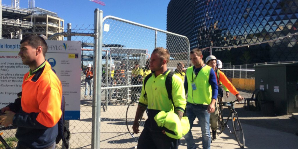 Workers leave the new RAH construction site today.