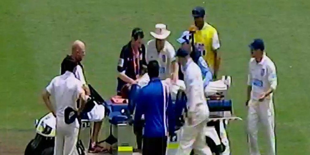 Phil Hughes was treated on the field after being struck by a bouncer.