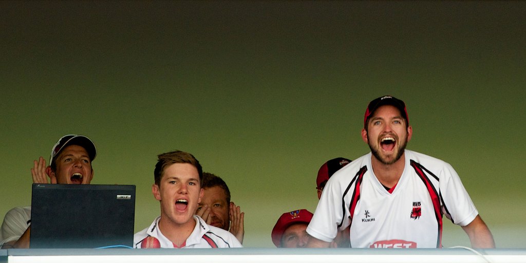 Wicket-takers Adam Zampa (second from left) and Chadd Sayers (right) celebrate as Tom Cooper hits the winning runs against the Bulls. Photo: Michael Errey