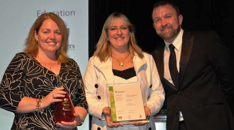 Naracoorte Independent Learning Centre's Tammy Schinckel, centre, and Lisa Riley receiving their Brand South Australia Regional Award, with Flinders University's Grant Smyth.  